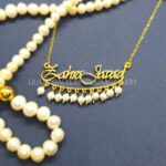 پلاک طلا دو اسم زهرا و جواد